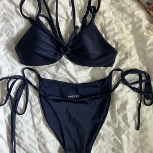 OneOne swim wear bikini. Top is small bottoms are medium.